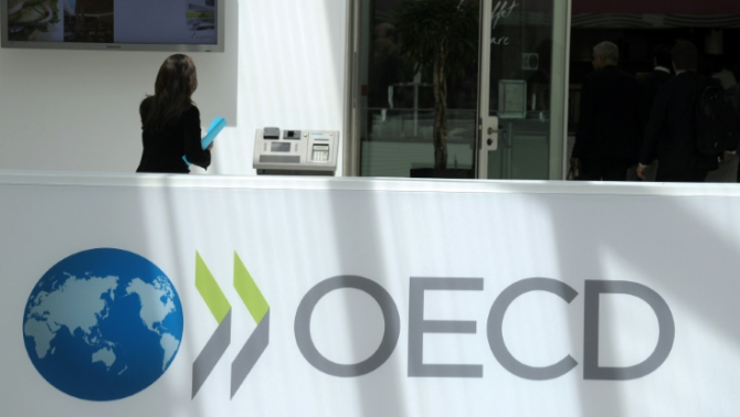oecd-เตือนนโยบายภาษีสหรัฐฯกระทบเศรษฐกิจโลกในปีนี้